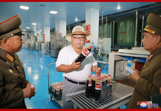 Ким Чен Ын на фабрике обработки засоленных рыбных продуктов 2